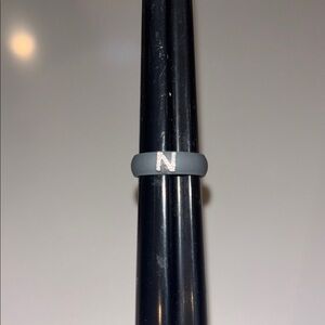 Casual Carat Gray Silcone Ring with N pave diamonds.